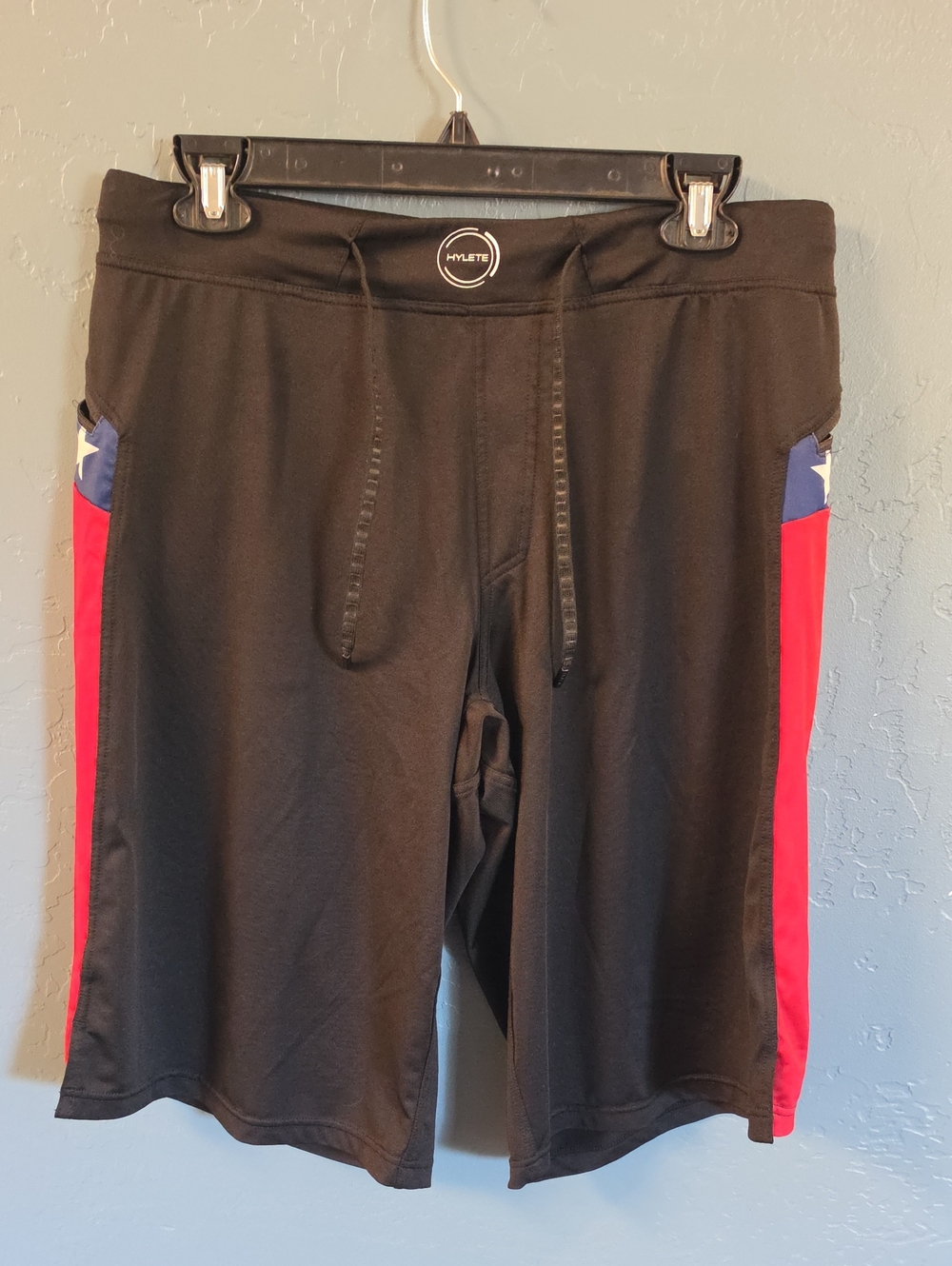 Hylete Men’s Black Athletic Shorts with Red Side Panels and Blue Star Accents